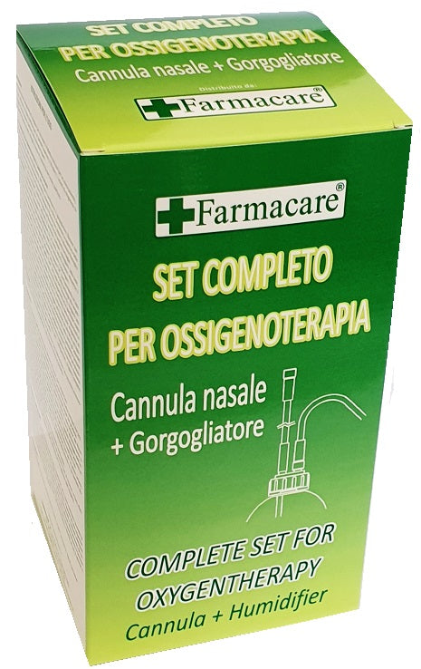 Set per ossigenoterapia con sostegno a occhiale munito di tubo di collegamento flessibile antiotturamento ed un gorgogliatore per umidufucazione